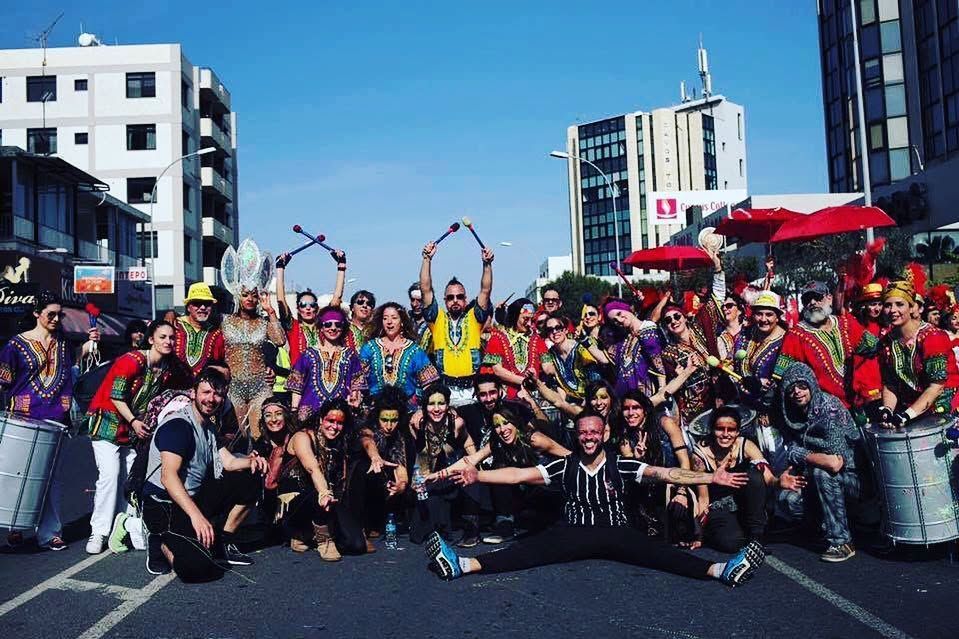 Apêiara capoeiristas and drummers in carnival costumes at the Limassol Carnival parade