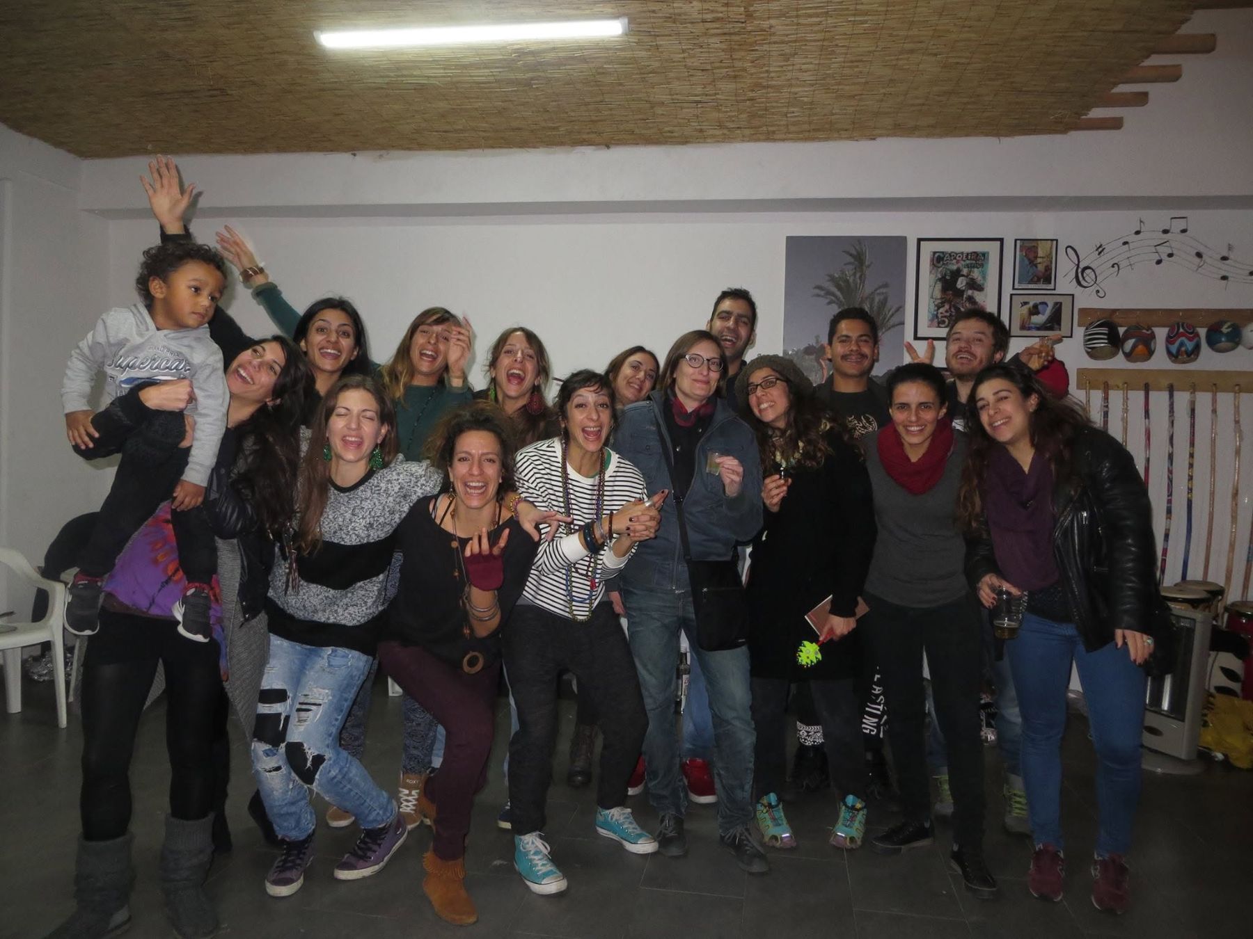 Apêiara students laughing together at the academy Christmas party