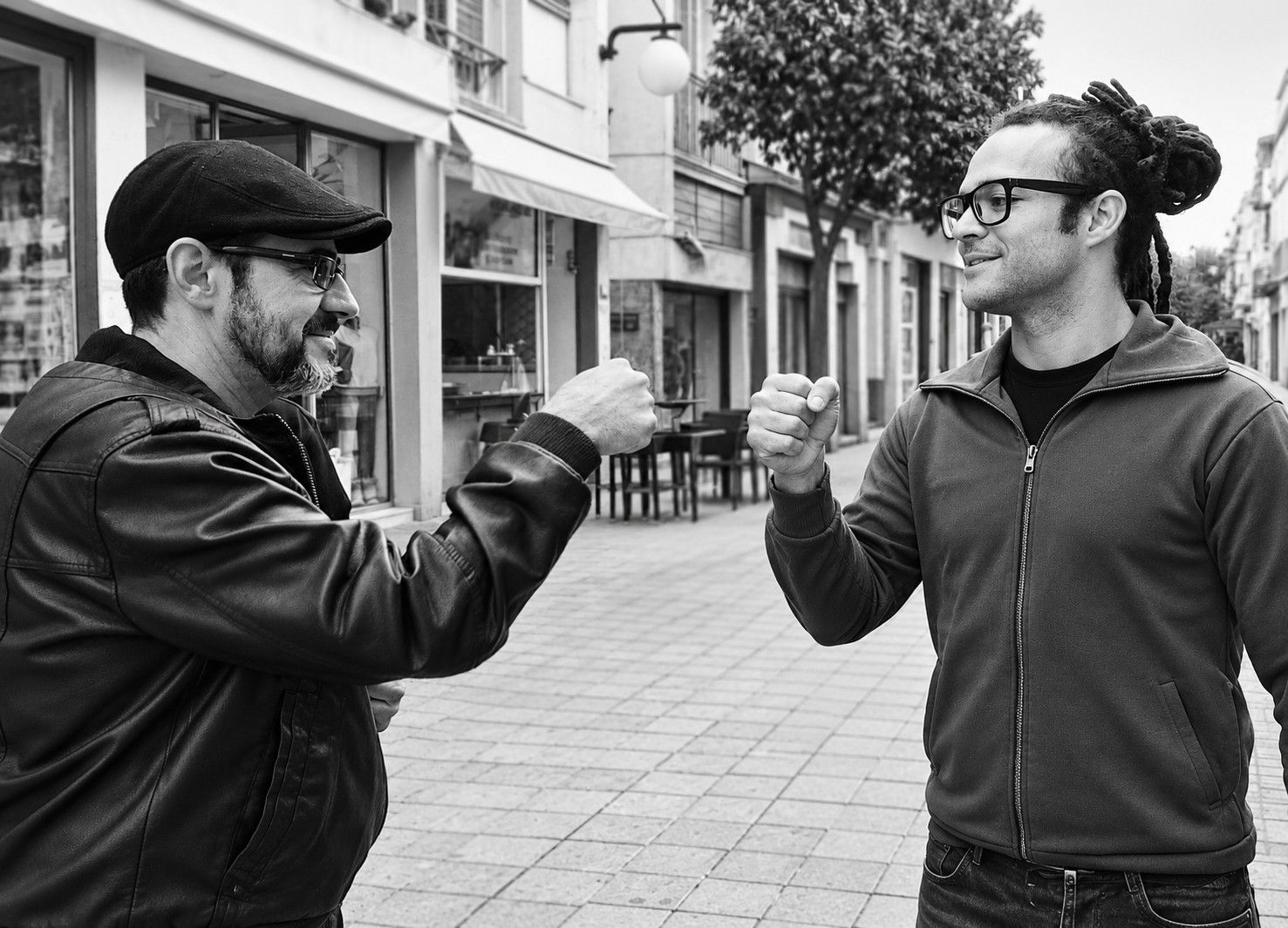 Mestre José Antonio and Mestre Casquinha greeting each other in Nicosia